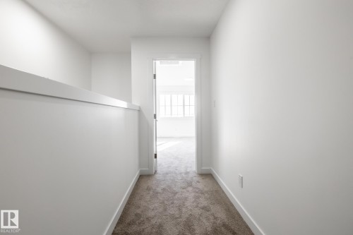 #37 7110 Keswick Cm Sw, Edmonton, AB - Indoor Photo Showing Other Room
