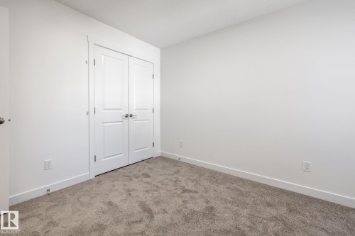 #37 7110 Keswick Cm Sw, Edmonton, AB - Indoor Photo Showing Other Room