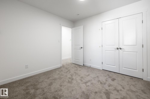 #37 7110 Keswick Cm Sw, Edmonton, AB - Indoor Photo Showing Other Room