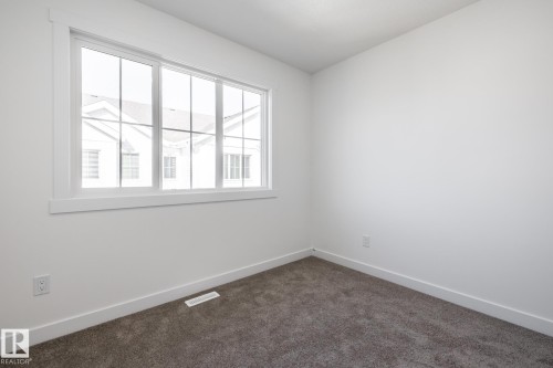 #37 7110 Keswick Cm Sw, Edmonton, AB - Indoor Photo Showing Other Room