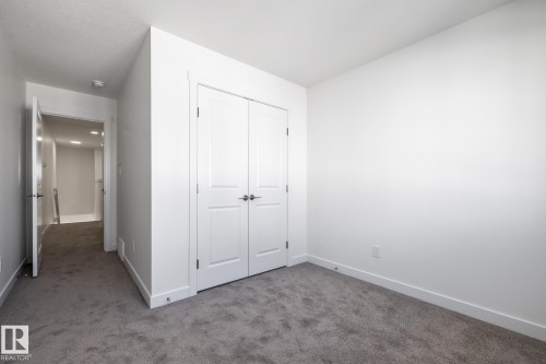#37 7110 Keswick Cm Sw, Edmonton, AB - Indoor Photo Showing Other Room