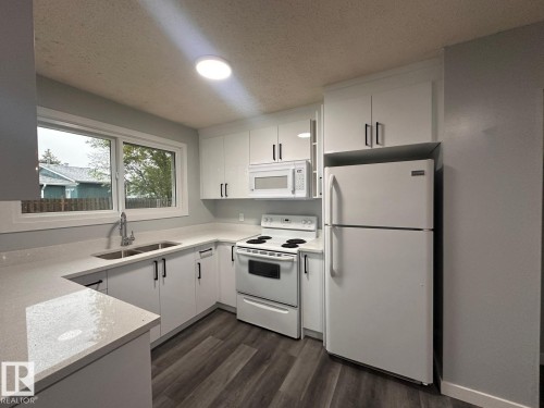 2613 105A Street Northwest, Edmonton, AB - Indoor Photo Showing Kitchen With Double Sink