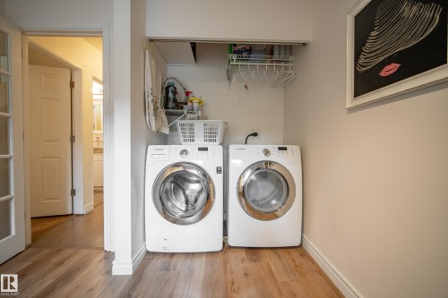 on main level - 7215 96B Avenue Nw, Edmonton, AB - Indoor Photo Showing Laundry Room