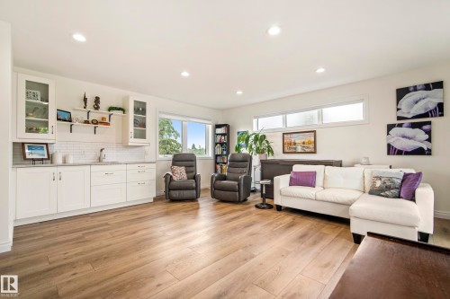 on upper level - 7215 96B Avenue Nw, Edmonton, AB - Indoor Photo Showing Living Room