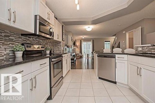#95 4050 Savaryn Dr Sw, Edmonton, AB - Indoor Photo Showing Kitchen With Upgraded Kitchen