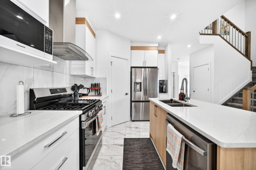 3605 41 Avenue, Beaumont, AB - Indoor Photo Showing Kitchen With Double Sink With Upgraded Kitchen