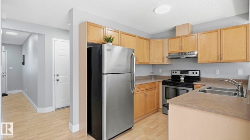 5507 163 Avenue Nw, Edmonton, AB - Indoor Photo Showing Kitchen With Double Sink