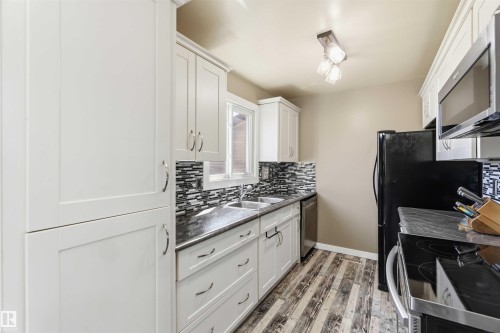 135 Birch Drive, Gibbons, AB - Indoor Photo Showing Kitchen With Double Sink