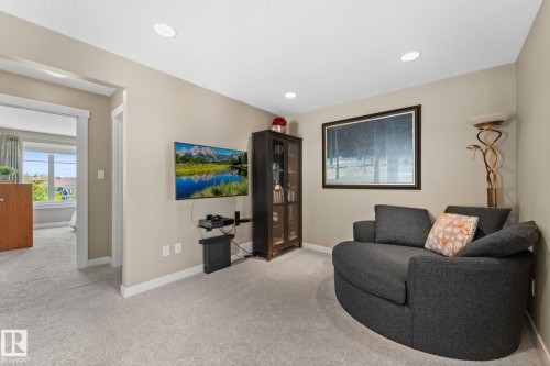 Carpeted room with recessed lighting and neutral wall paint - 3413 Cameron Heights Cove Nw, Edmonton, AB - Indoor Photo Showing Other Room