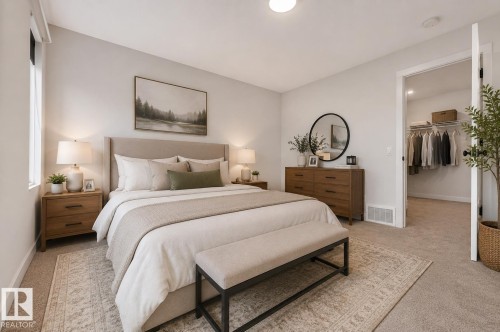 Bedroom featuring a neutral color palette, plush carpeting, and a window with roller shades - 1534 Plum Circle Circle Sw, Edmonton, AB - Indoor Photo Showing Bedroom