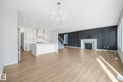 6404 176 Avenue Nw, Edmonton, AB - Indoor Photo Showing Other Room With Fireplace