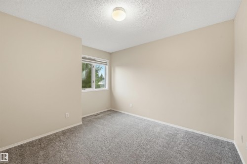 219 Buchanan Close Nw, Edmonton, AB - Indoor Photo Showing Other Room
