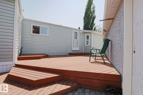 Expansive wood deck with multi-level design and wide steps - 137 Lee Ridge Road Nw, Edmonton, AB - Outdoor With Exterior
