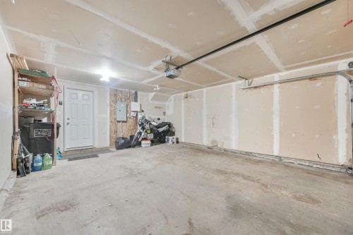 Image quality insufficient for description - #40 1030 Chappelle Bv Sw, Edmonton, AB - Indoor Photo Showing Garage