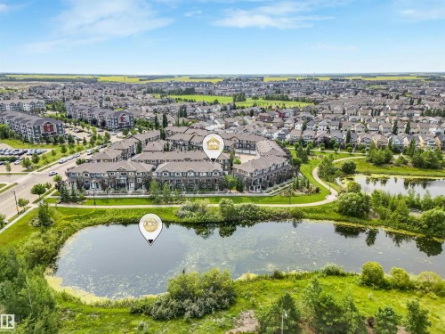 Expansive residential development featuring multi-level townhomes and detached properties - #40 1030 Chappelle Bv Sw, Edmonton, AB - Outdoor With View