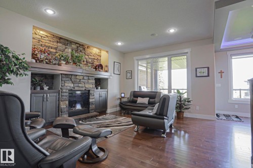 91 Danfield Place, Spruce Grove, AB - Indoor Photo Showing Living Room With Fireplace