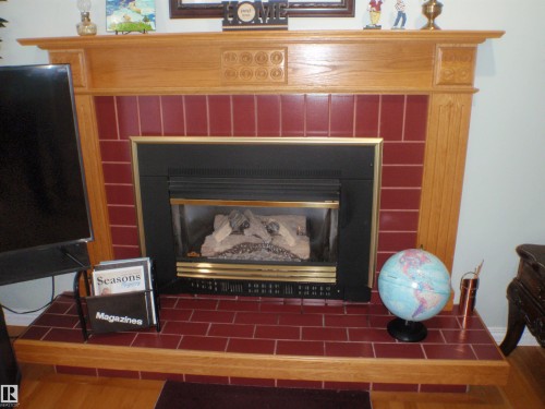 5802 53 Street, Barrhead, AB - Indoor Photo Showing Living Room With Fireplace