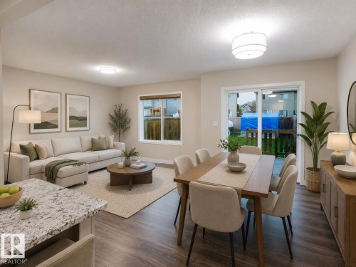 Open-concept living and dining area featuring wood-finish flooring, recessed lighting, and a sliding glass door to the exterior - 5407 14 Avenue Sw, Edmonton, AB - Indoor