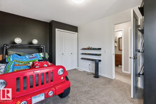 Plush carpeted flooring complementing light gray walls - 109 Selkirk Place, Leduc, AB - Indoor Photo Showing Bedroom