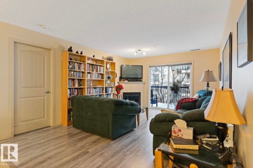 #203 17407 99 Av Nw, Edmonton, AB - Indoor With Fireplace