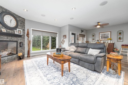 156 Greenfield Way, Fort Saskatchewan, AB - Indoor Photo Showing Living Room With Fireplace