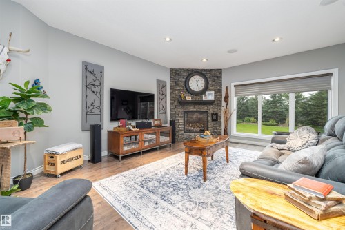 156 Greenfield Way, Fort Saskatchewan, AB - Indoor Photo Showing Living Room With Fireplace