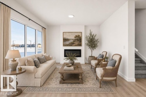 4182 Kinglet Drive Nw, Edmonton, AB - Indoor Photo Showing Living Room With Fireplace