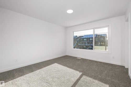 4182 Kinglet Drive Nw, Edmonton, AB - Indoor Photo Showing Other Room