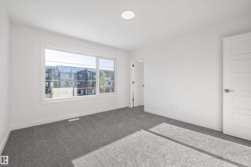 4182 Kinglet Drive Nw, Edmonton, AB - Indoor Photo Showing Other Room