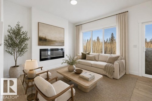 4184 Kinglet Drive Nw, Edmonton, AB - Indoor Photo Showing Living Room With Fireplace