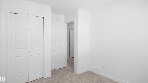 7387 Keeler Crescent Sw, Edmonton, AB - Indoor Photo Showing Other Room