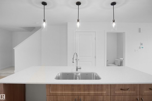 7385 Keeler Crescent Sw, Edmonton, AB - Indoor Photo Showing Kitchen With Upgraded Kitchen