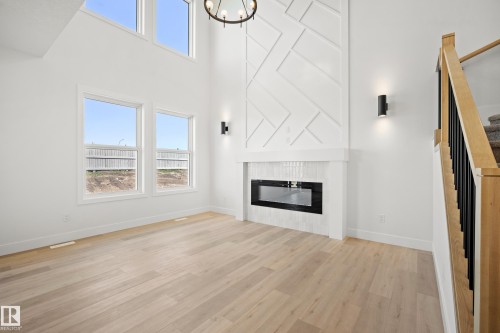 8533 223A Street Nw, Edmonton, AB - Indoor Photo Showing Living Room With Fireplace