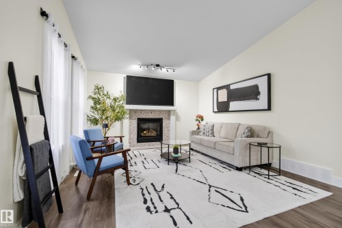 6741 162A Avenue Nw, Edmonton, AB - Indoor Photo Showing Living Room With Fireplace
