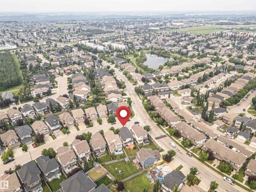 Aerial perspective showcasing a residential area with varied housing styles - 2605 Anderson Crescent Sw, Edmonton, AB - 