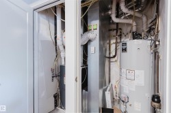 Dedicated utility closet housing the water heater and HVAC system - 
