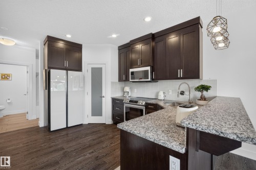 89 Sandalwood Place, Leduc, AB - Indoor Photo Showing Kitchen With Upgraded Kitchen