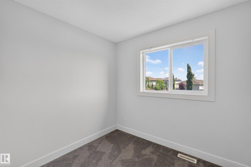 89 Sandalwood Place, Leduc, AB - Indoor Photo Showing Other Room