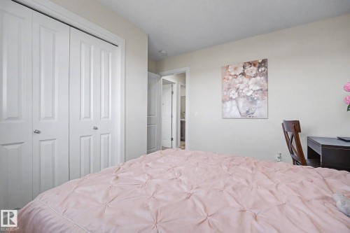 Room with light neutral wall paint - 22419 80 Avenue Nw, Edmonton, AB - Indoor Photo Showing Bedroom
