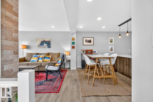 2nd Floor featuring Kitchen, Dining Room, Living Room, and Half Bath. - 1051 Cy Becker Road Nw, Edmonton, AB - Indoor