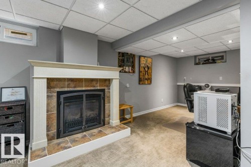 14119 73 Street Nw, Edmonton, AB - Indoor Photo Showing Basement With Fireplace