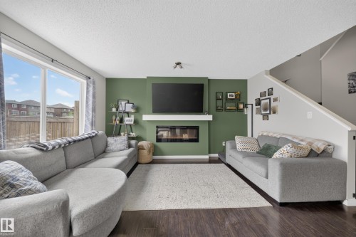 2155 67 Street Sw, Edmonton, AB - Indoor Photo Showing Living Room With Fireplace