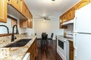 #310 14004 26 St Nw, Edmonton, AB  - Indoor Photo Showing Kitchen With Double Sink 