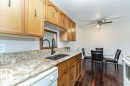 #310 14004 26 St Nw, Edmonton, AB  - Indoor Photo Showing Kitchen With Double Sink 