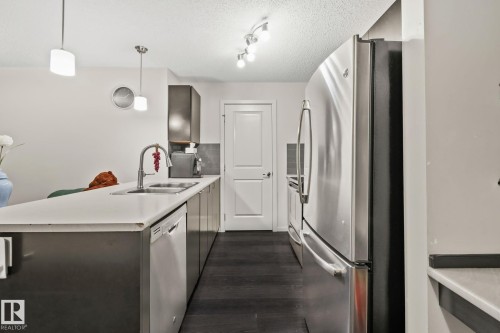 #226 344 Windermere Rd Nw, Edmonton, AB - Indoor Photo Showing Kitchen With Stainless Steel Kitchen With Double Sink With Upgraded Kitchen