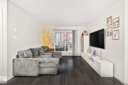 #226 344 Windermere Rd Nw, Edmonton, AB - Indoor Photo Showing Living Room