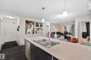 #226 344 Windermere Rd Nw, Edmonton, AB  - Indoor Photo Showing Kitchen With Double Sink 