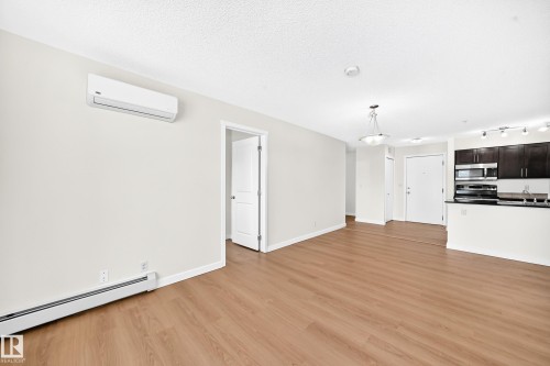 #206 3315 James Mowatt Tr Sw, Edmonton, AB - Indoor Photo Showing Kitchen