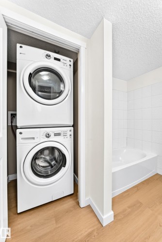 #206 3315 James Mowatt Tr Sw, Edmonton, AB - Indoor Photo Showing Laundry Room