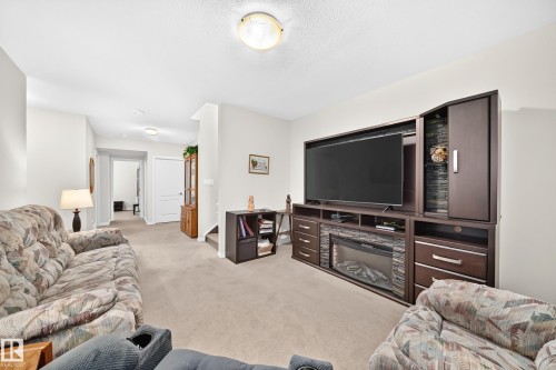 2681 Sir Arthur Currie Way Nw, Edmonton, AB - Indoor Photo Showing Living Room
